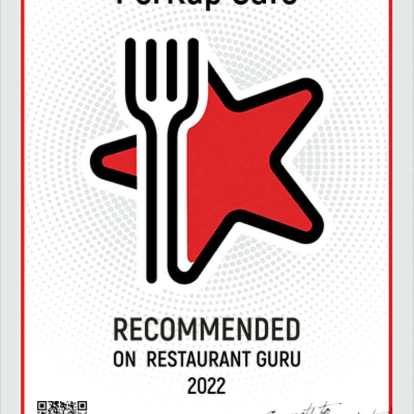 PerKup Cafe's 2022 Restaurant Guru recommendation badge, featuring a fork and red star.